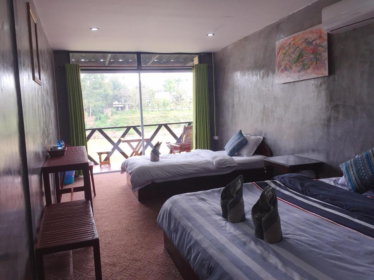 Mao Phasok Riverside Guesthouse لوانغ برابانغ المظهر الخارجي الصورة